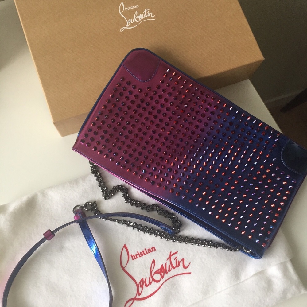 Louboutin clutch with chain, leather